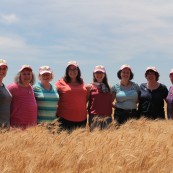 Finalists on the Farm Tour taking a look at Joe Kejr's wheat field.